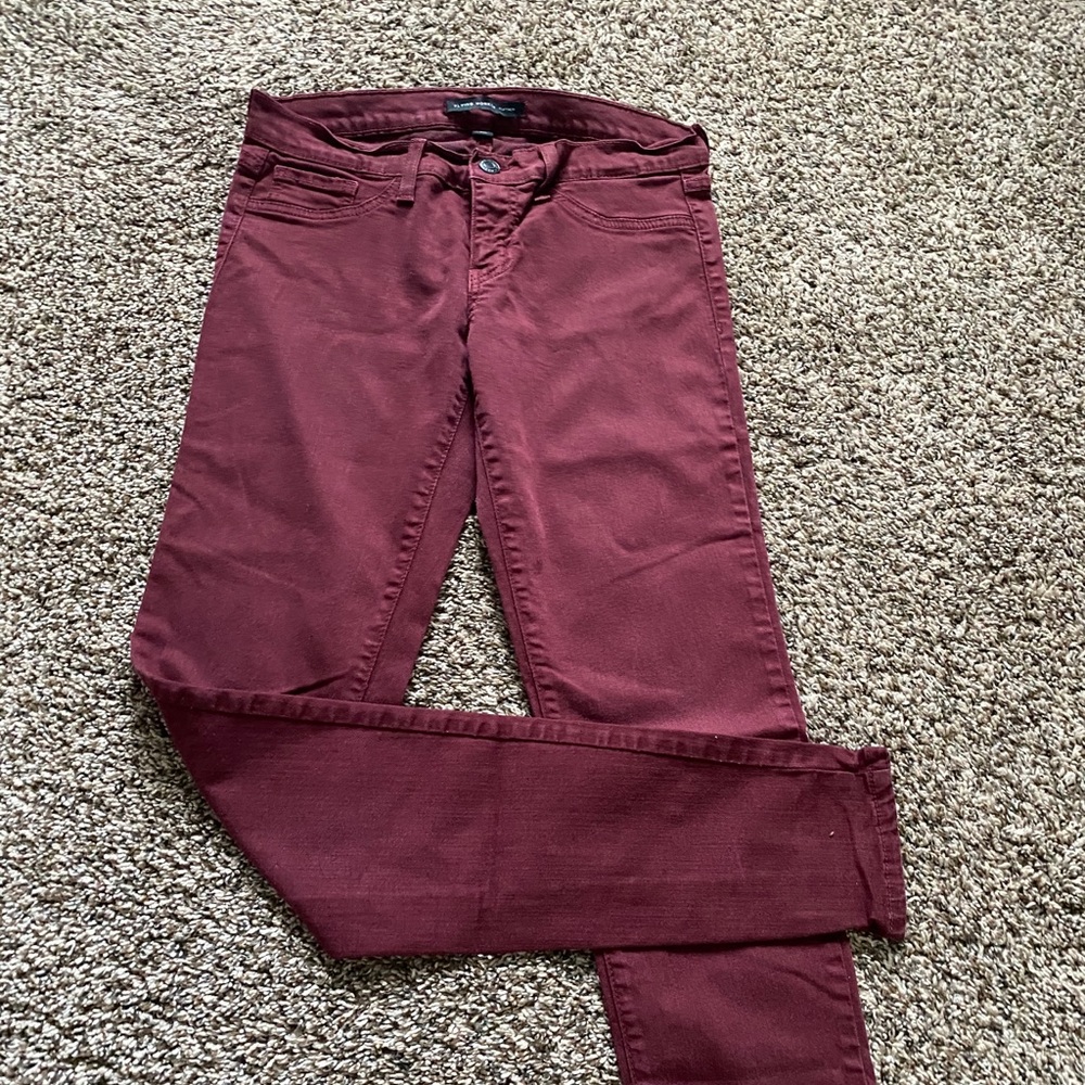 Burgundy skinny jeans